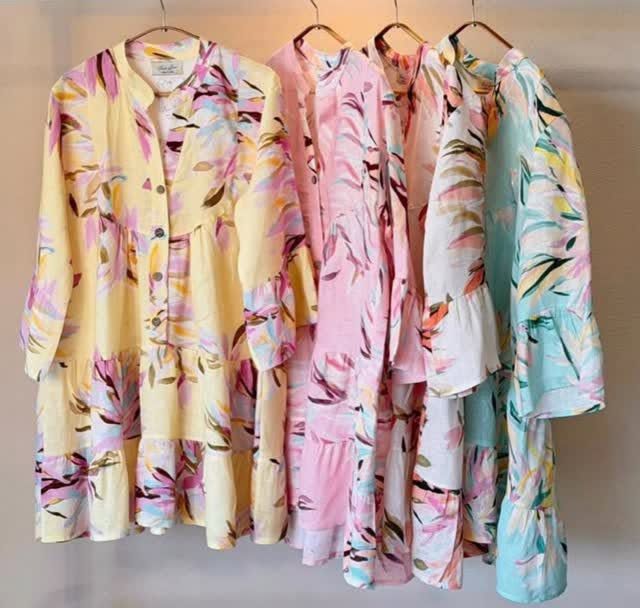 Pastel printed dresses in yellow, pink, white and aqua
